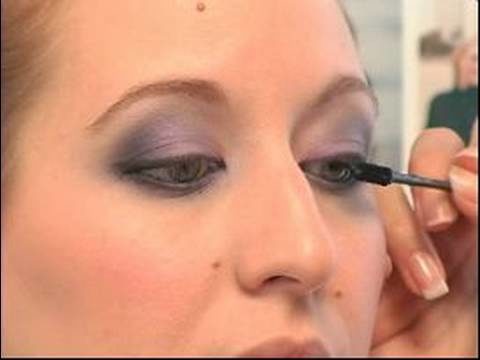 Purple Eye Shadow Tips : Applying Mascara to Eyelashes