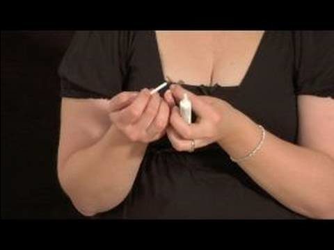 How to Apply False Eyelashes : Applying Glue to First False Eyelash