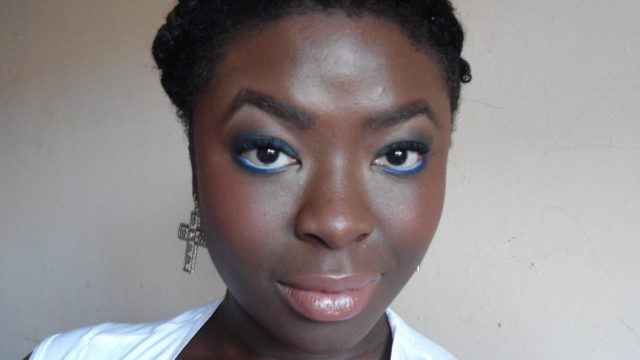 (26) Blue eyeshadow Peacock inspired make-up look. Dark skin woman can wear colour